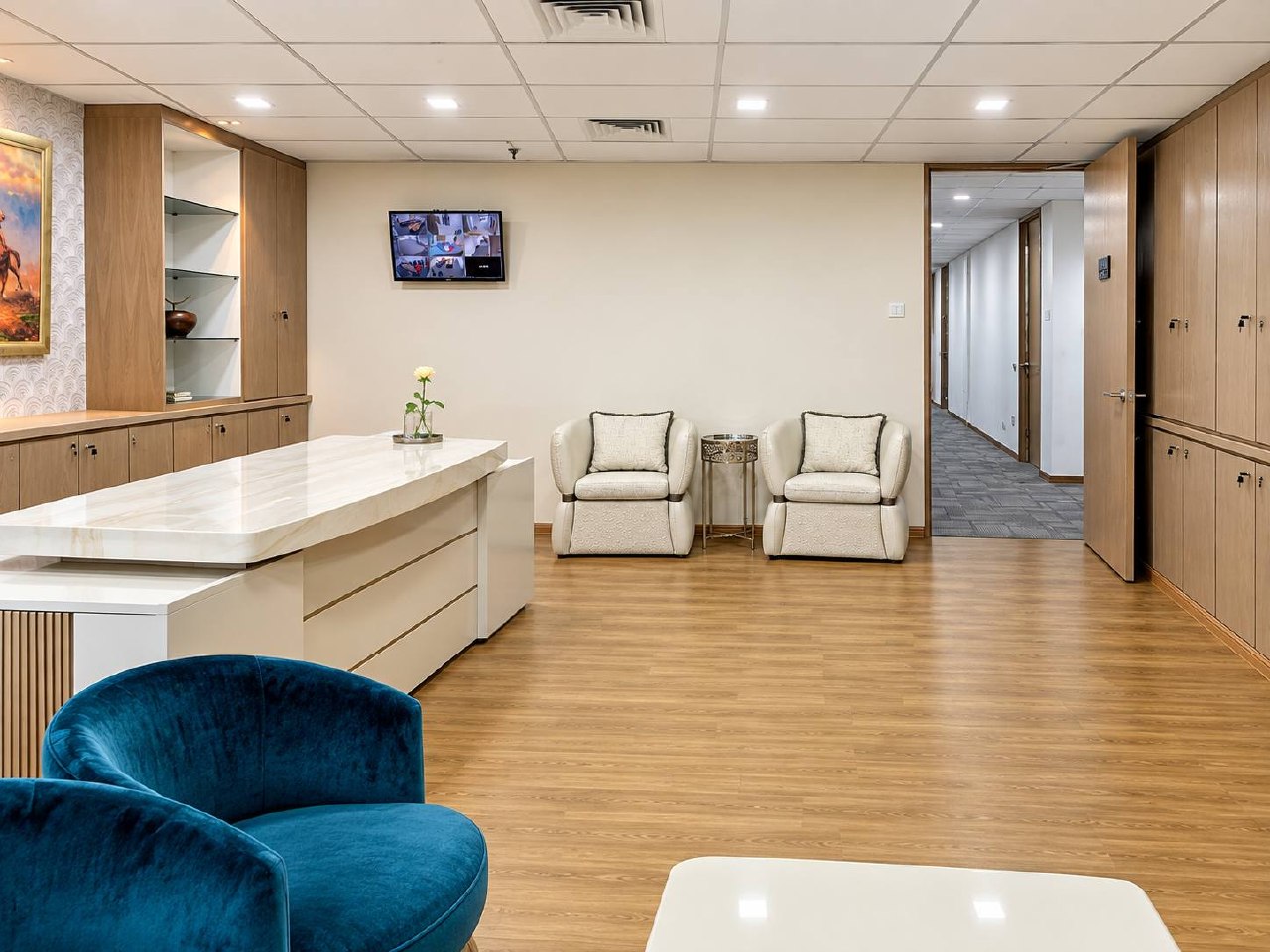 Office reception area with built-in storage and lounge seating