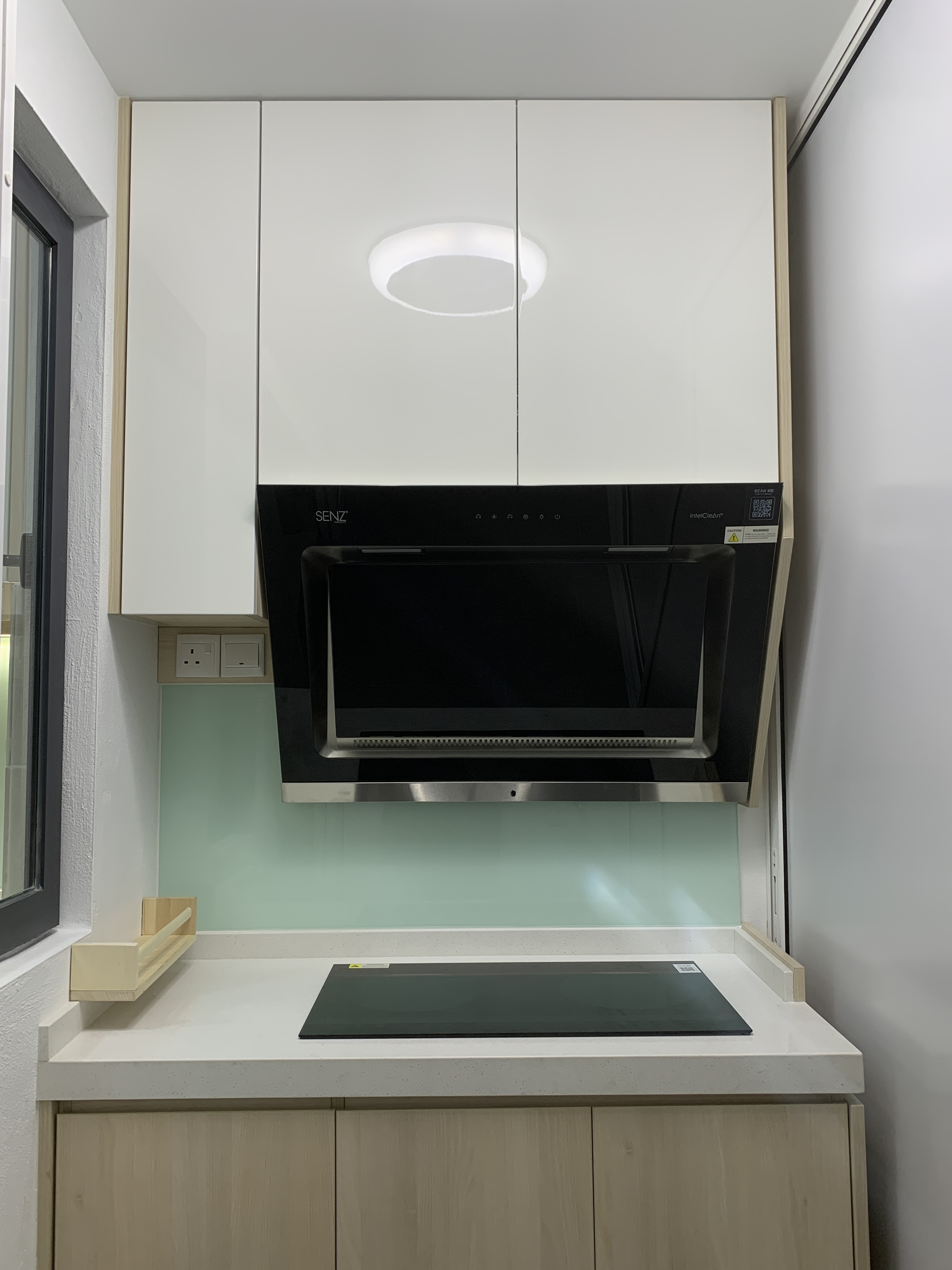 PV9 kitchen hob and cabinetry
