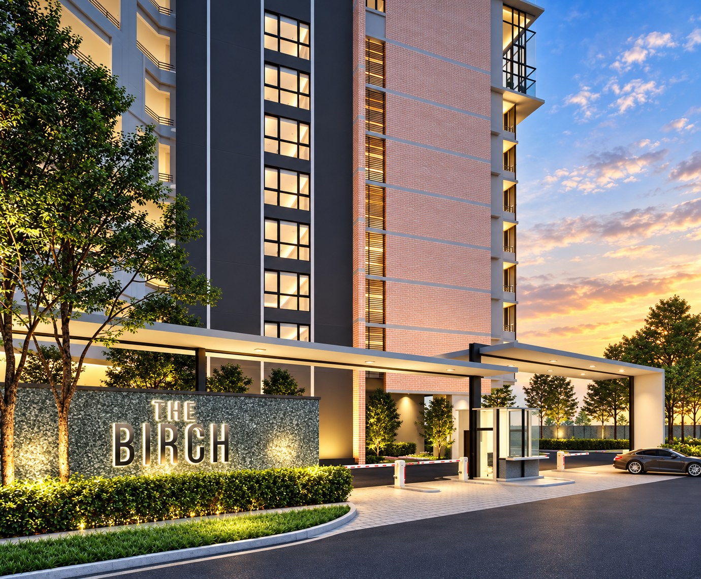The Birch residential tower entrance at dusk